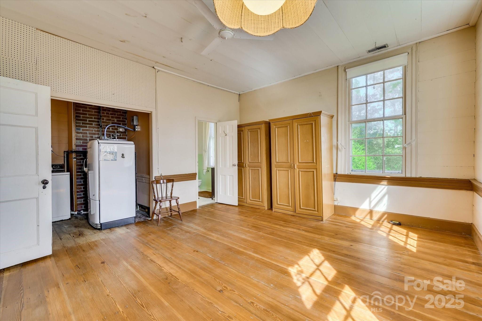 621 Meeting Street Road Edgefield, SC 29824 - Photo 31 of 40 a view of a livingroom with wooden floor and a window