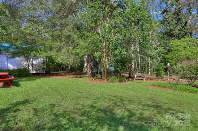 front view of a house with a garden