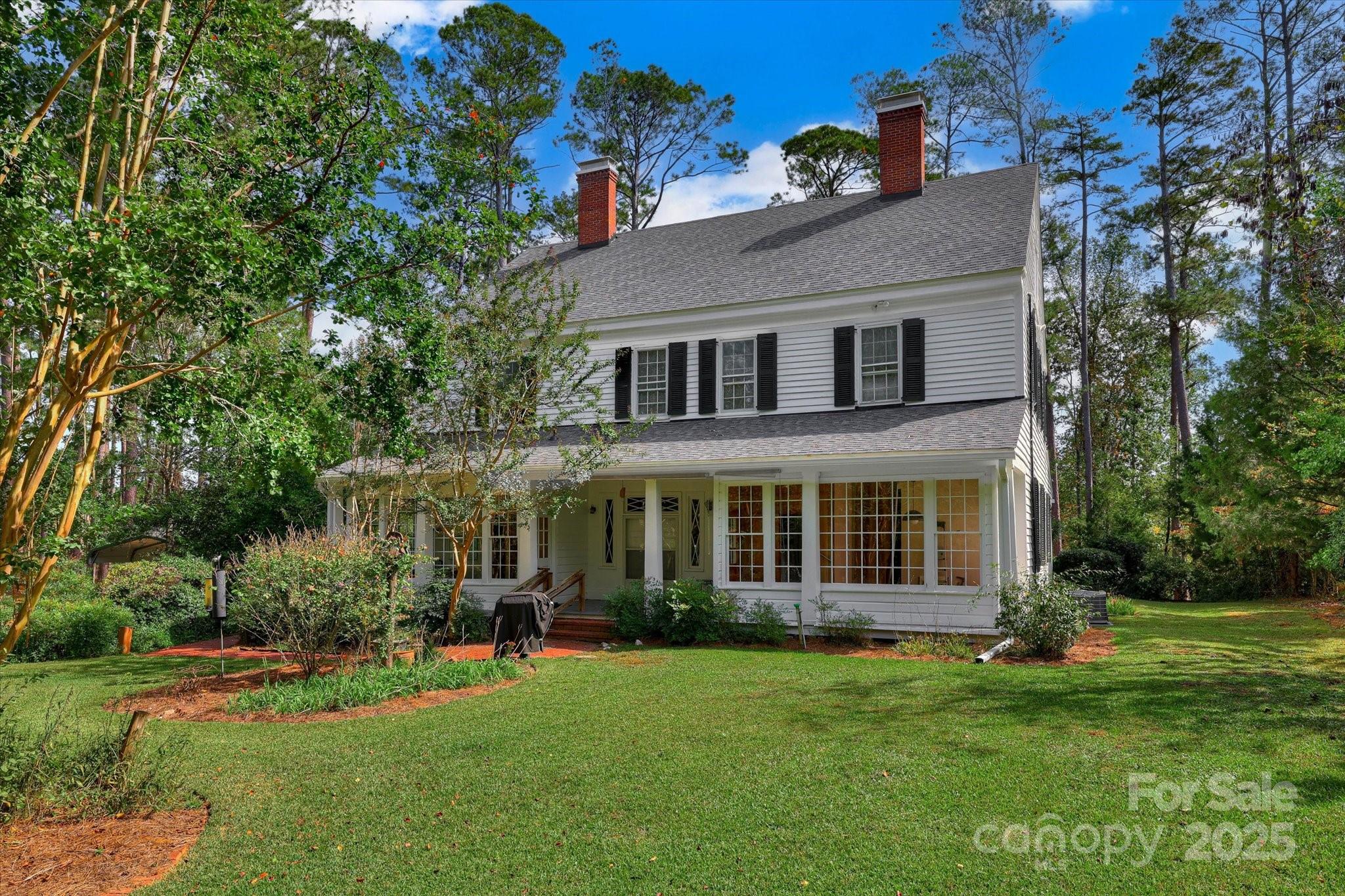 621 Meeting Street Road Edgefield, SC 29824 - Photo 34 of 40 front view of a house with a garden
