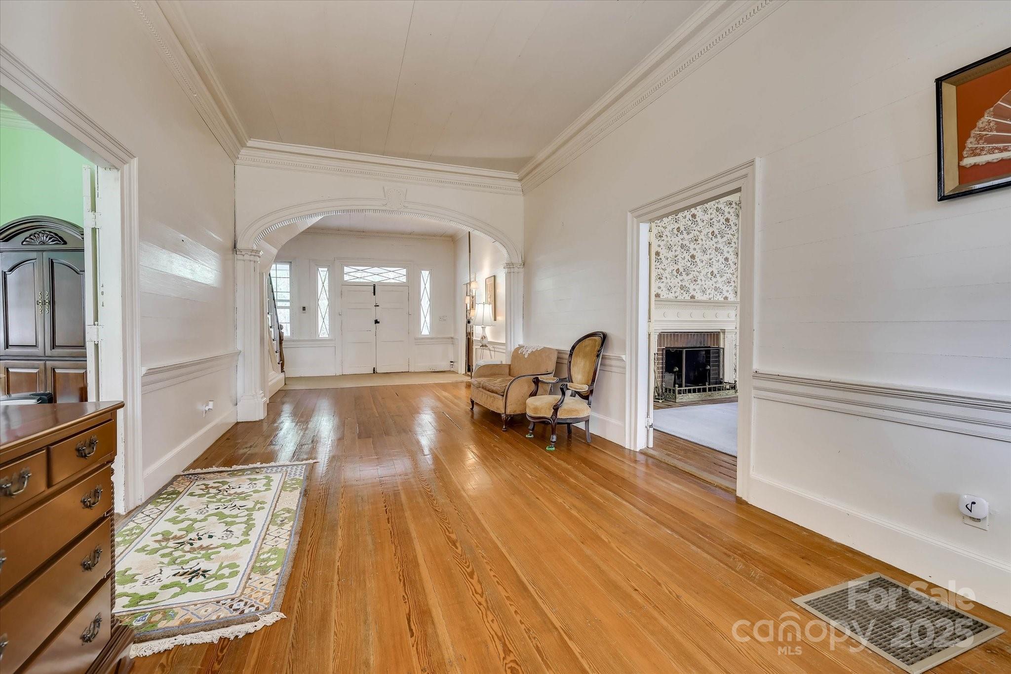 621 Meeting Street Road Edgefield, SC 29824 - Photo 10 of 40 a living room with furniture and a wooden floor