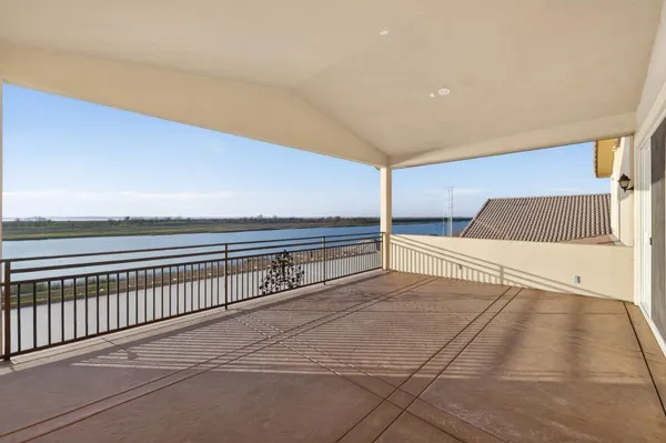 a living room with fireplace furniture and a wooden floor