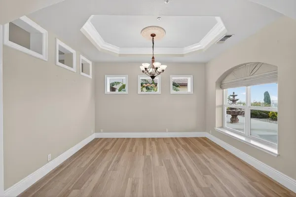 a bathroom with a sink mirror and vanity