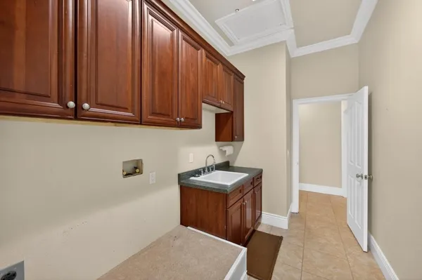 a view of a lake with sunset in background