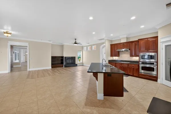 a bathroom with a bathtub and a window