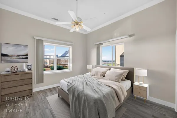 a view of a dining room with furniture wooden floor and chandelier