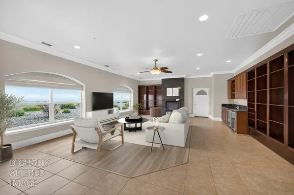 a kitchen with granite countertop a cabinets and a stove top oven