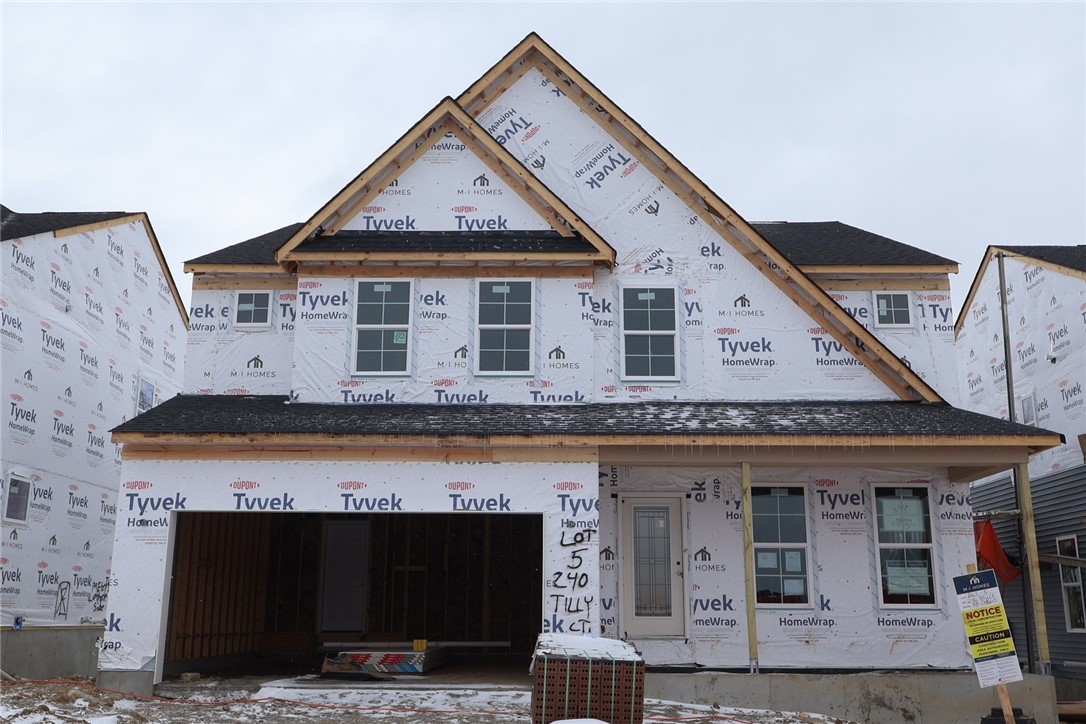 240 Tilly Court, Unit 5 Springboro, OH 45066 - Photo 14 of 26 This new construction home features an attached garage and striking rooflines.