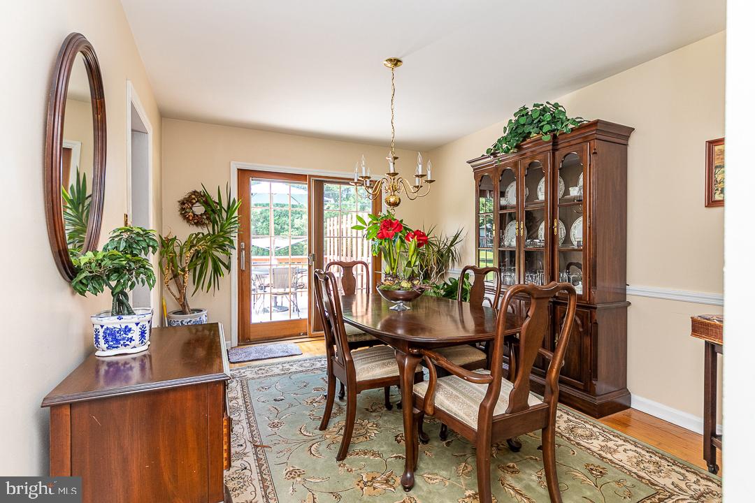 737 Whitebriar Road Hockessin, DE 19707 - Photo 13 of 25 Formal Dining Room with Sliding Door to Deck