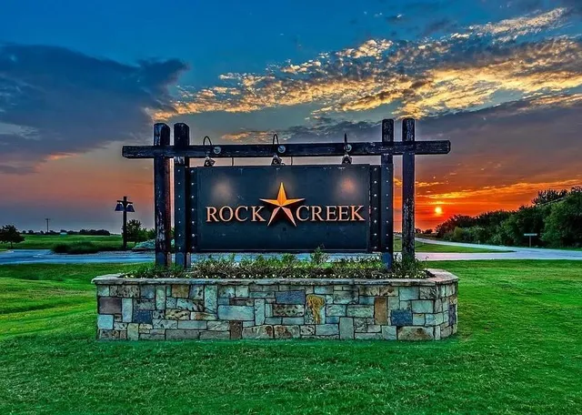 a sign on the side of the road