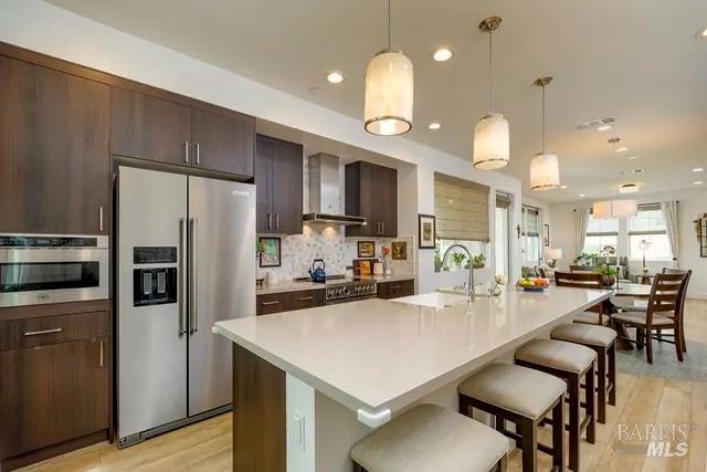 715 Rockview Road Novato, CA 94949 - Photo 36 of 36 Modern kitchen with designer upgrades, Bertazzoni appliances, large Ceasarstone island, luxury wide-plank flooring, open concept floor plan perfect for entertaining.