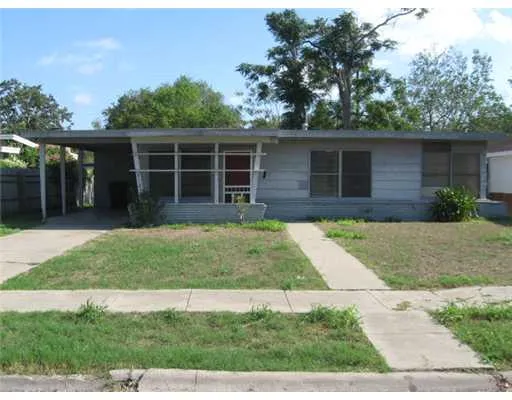 front view of house with a yard