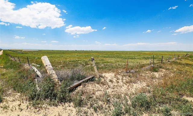 a view of an ocean and a building