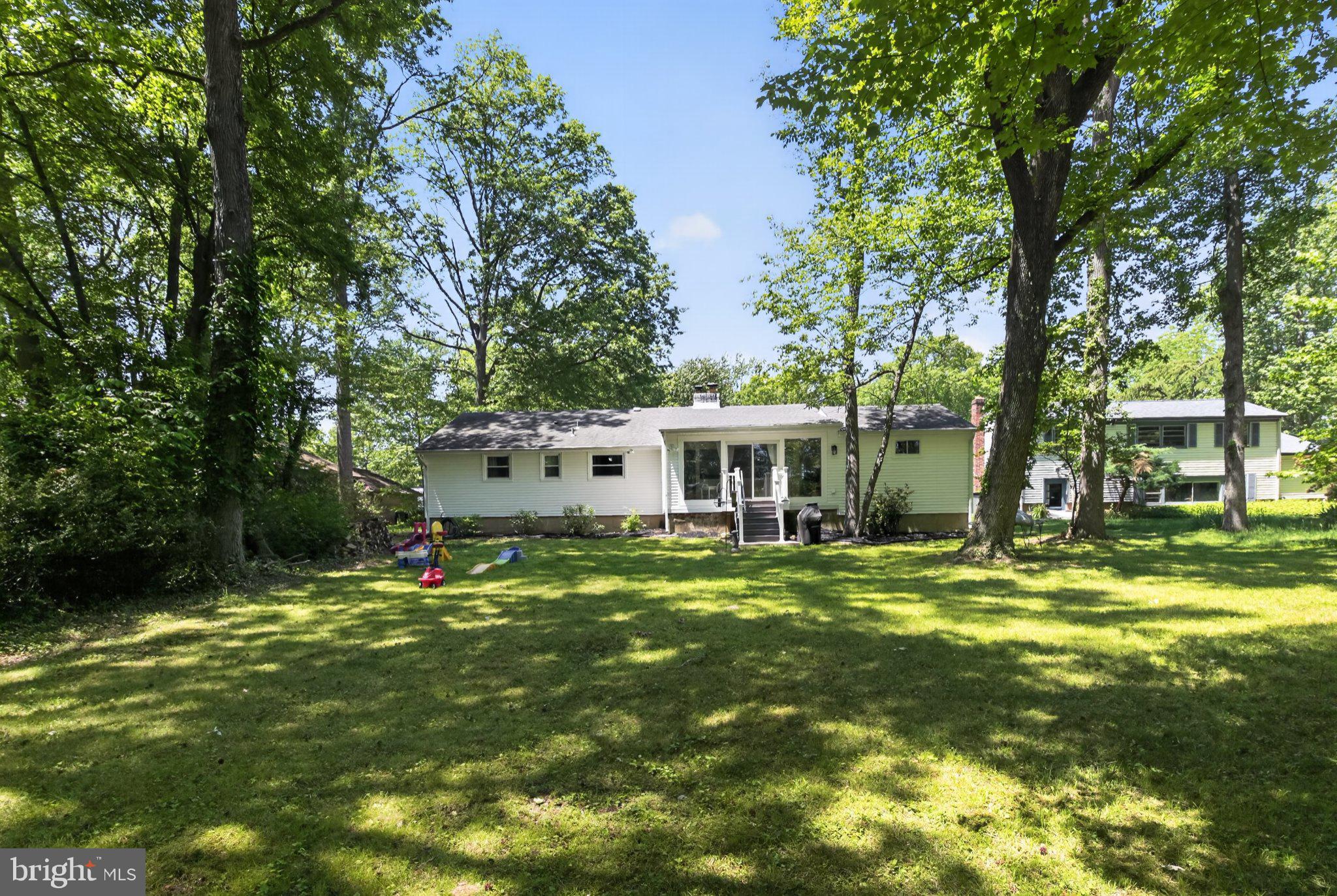 119 Sharrowvale Road Cherry Hill, NJ 08034 - Photo 35 of 36 Serene home nestled in lush greenery.