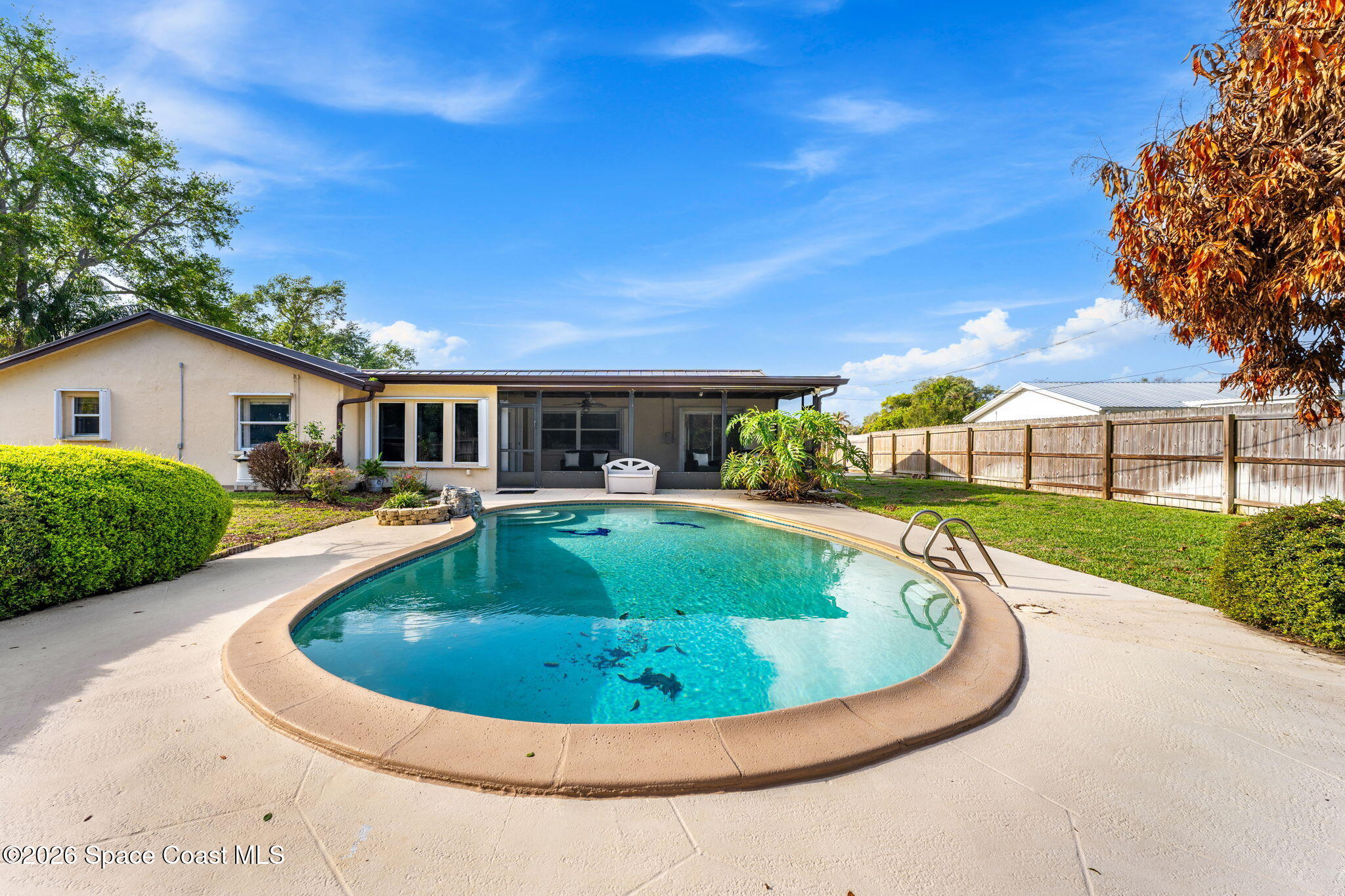 1310 St George Road Merritt Island, FL 32952 - Photo 49 of 59 a view of outdoor space yard swimming pool and patio