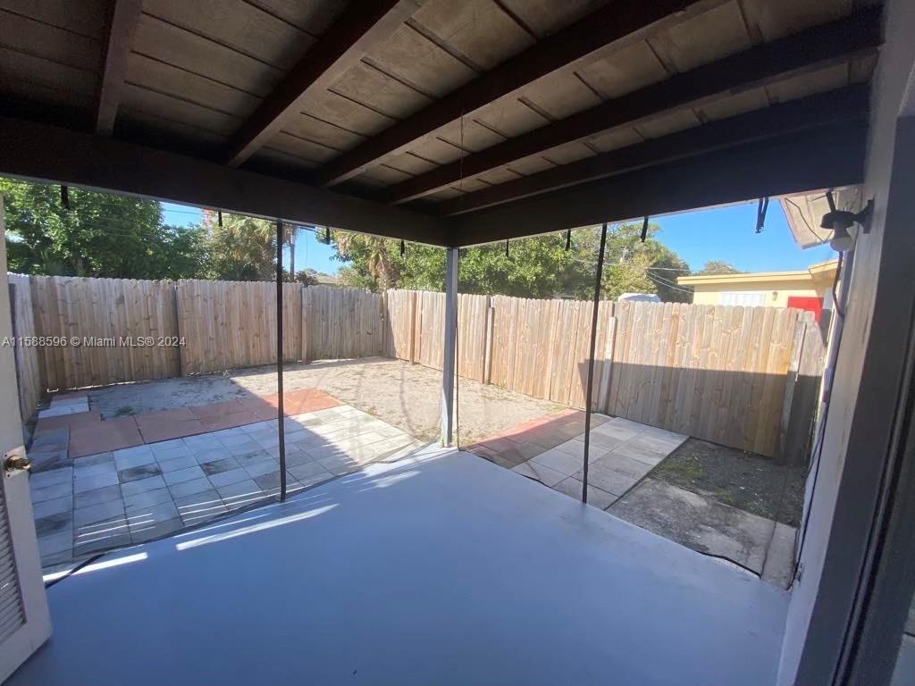 641 Silver Beach Road Riviera Beach, FL 33403 - Photo 13 of 13 a view of a backyard