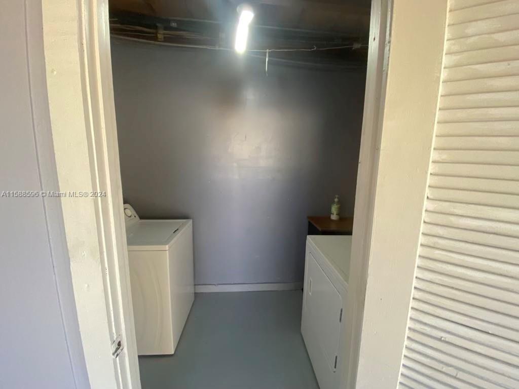 641 Silver Beach Road Riviera Beach, FL 33403 - Photo 6 of 13 a view of walk in closet