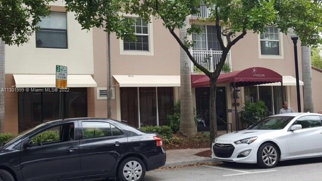 a car parked in front of a house