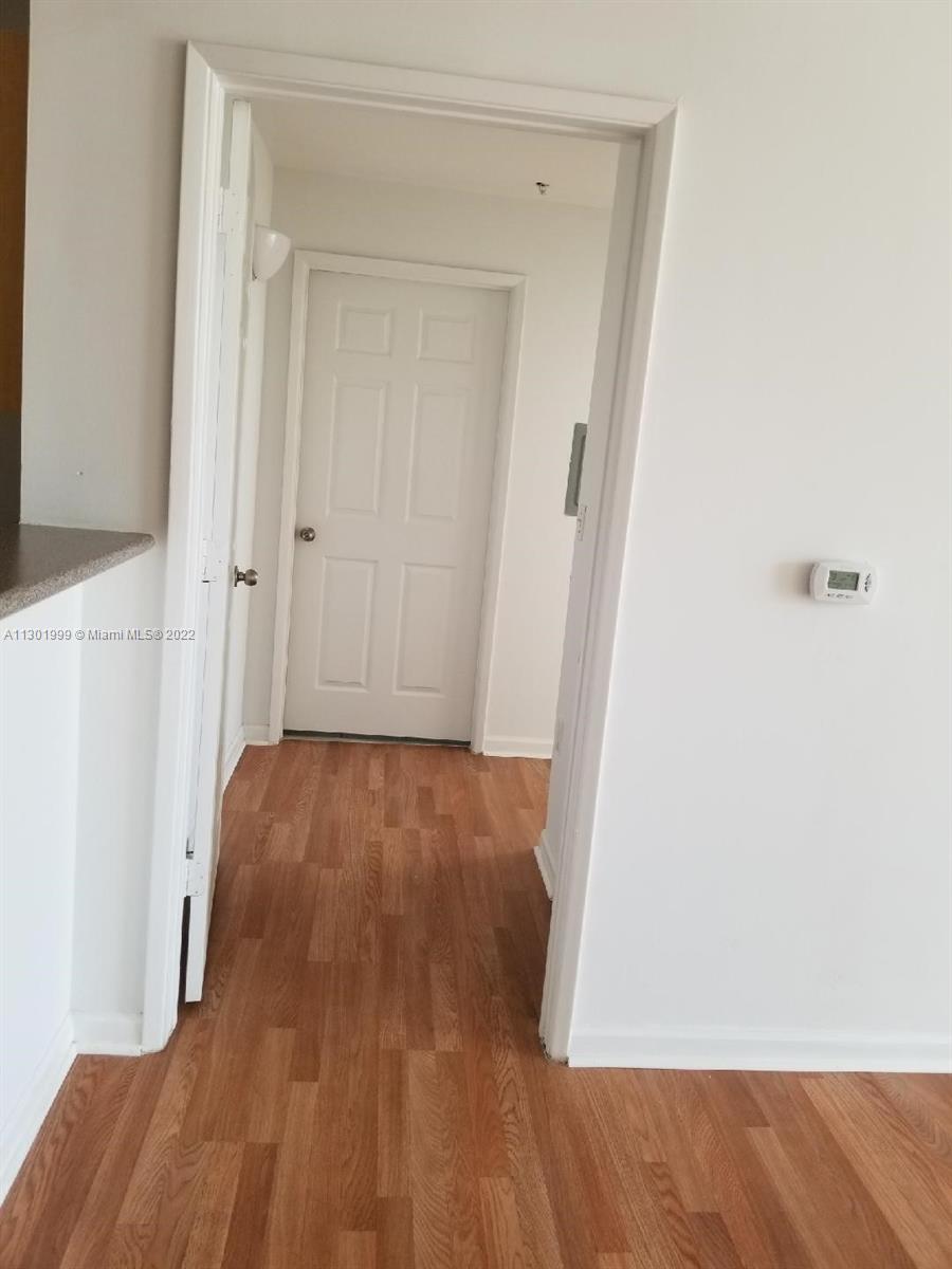 Parkside Hollywood, FL 33020 - Photo 11 of 26 a view of a room with wooden floor