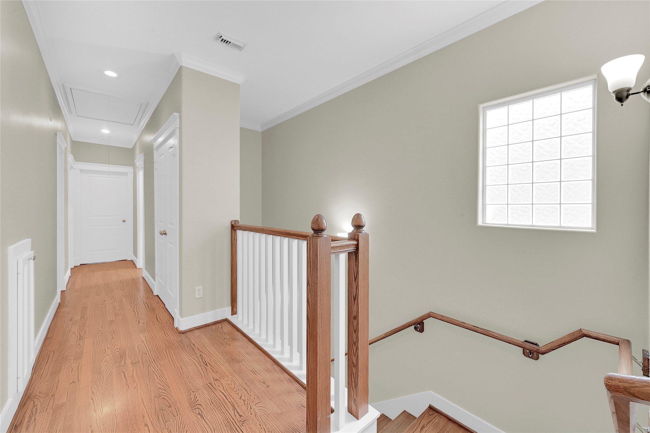 4418 Edsee Street Houston, TX 77009 - Photo 13 of 28 Once upstairs, you're geeted with warm wood flooring that leads you to the bedroom areas.