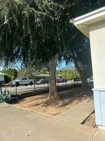 a view of backyard with green space