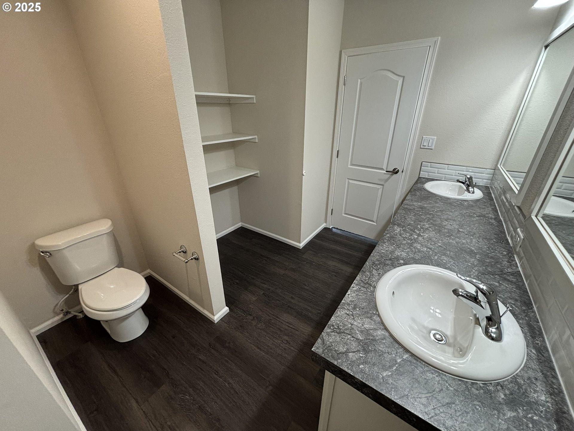 5270 Nopal Street Florence, OR 97439 - Photo 23 of 27 a bathroom with a granite countertop toilet sink and mirror