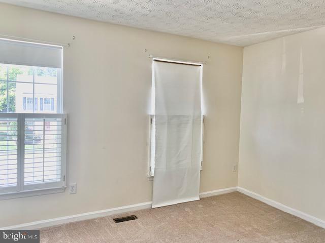 3207 Water Lily Court Laurel, MD 20724 - Photo 15 of 39 an empty room with windows