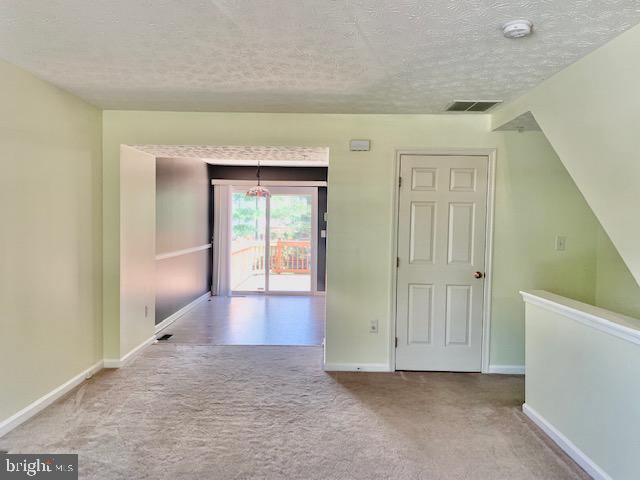 3207 Water Lily Court Laurel, MD 20724 - Photo 2 of 39 an empty room with wooden floor and windows