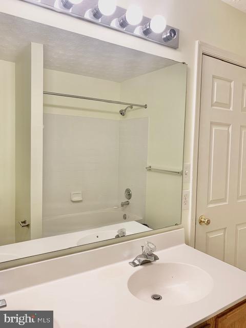 3207 Water Lily Court Laurel, MD 20724 - Photo 24 of 39 a bathroom with a sink and a mirror