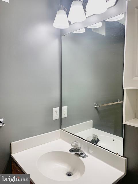 3207 Water Lily Court Laurel, MD 20724 - Photo 31 of 39 a bathroom with a sink and a mirror