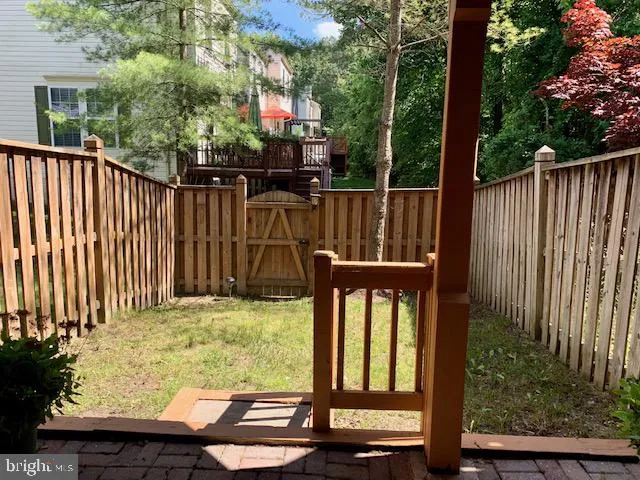 a view of a car parked on the side of the road