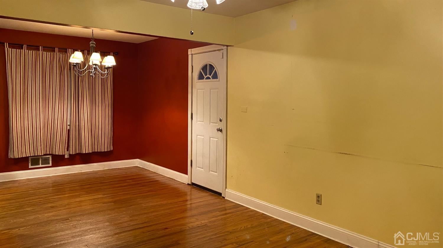 1 Terrill Road Edison, NJ 08817 - Photo 9 of 19 a view of a room with wooden floor and a window
