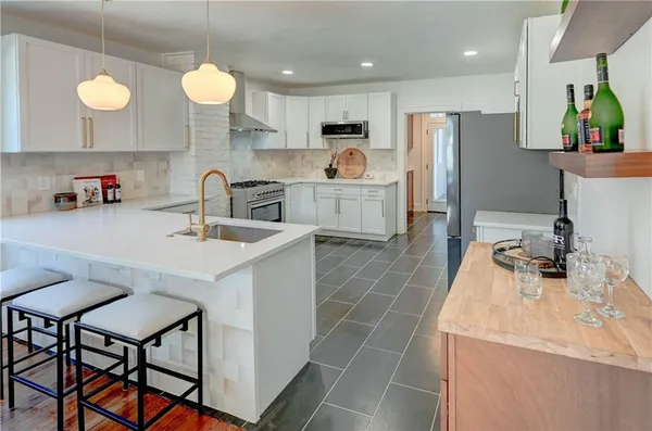 $1,165,000 | 426 West 57th Street, Kansas City, MO 64113