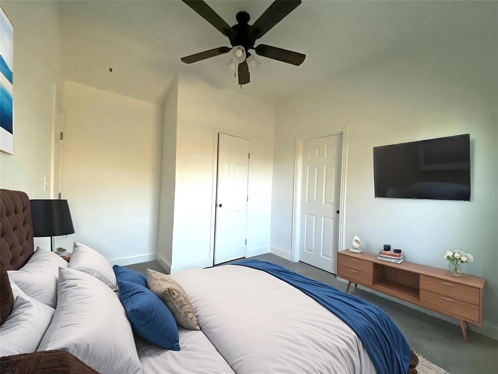 119 Ringo Drive Bridgeport, TX 76426 - Photo 4 of 10 a bedroom with a bed and a flat screen tv