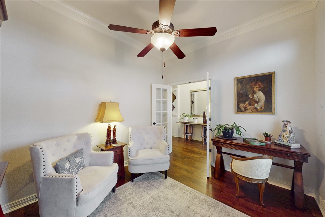 3317 Fiddlers Green Bryan, TX 77808 - Photo 14 of 36 a living room with furniture and a painting on the wall