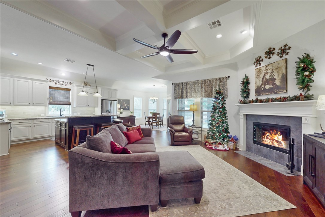 3317 Fiddlers Green Bryan, TX 77808 - Photo 15 of 39 Family Room with Gorgeous Tall Beamed Ceiling and Cozy Wood-burning Fireplace