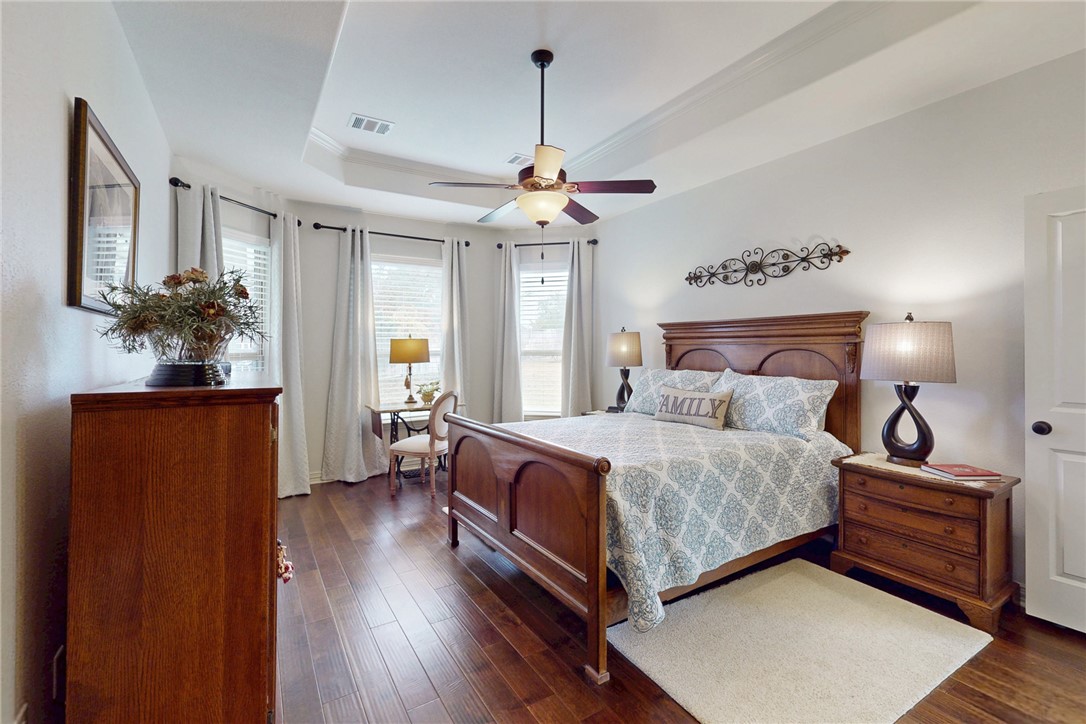 3317 Fiddlers Green Bryan, TX 77808 - Photo 15 of 36 Spacious Primary Bedroom with Tall Windows and Tray Ceiling
