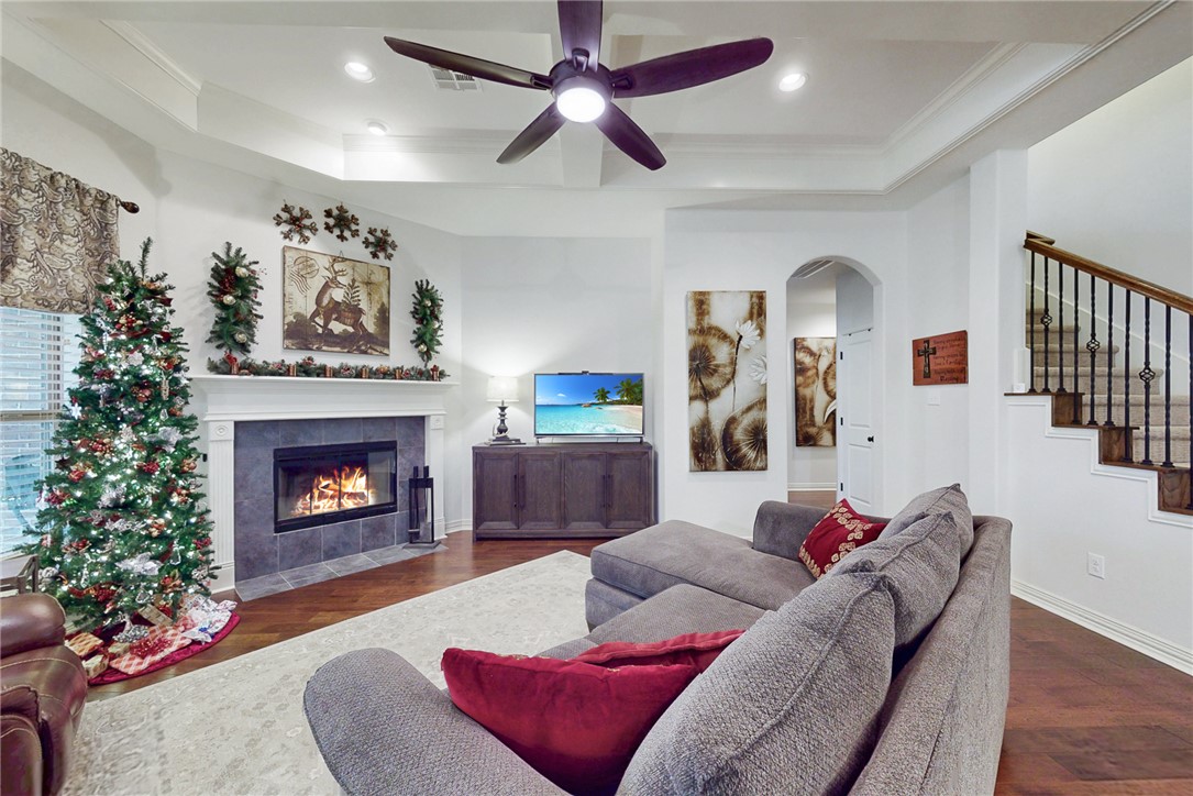 3317 Fiddlers Green Bryan, TX 77808 - Photo 17 of 39 Family Room with Gorgeous Tall Beamed Ceiling and Cozy Wood-burning Fireplace