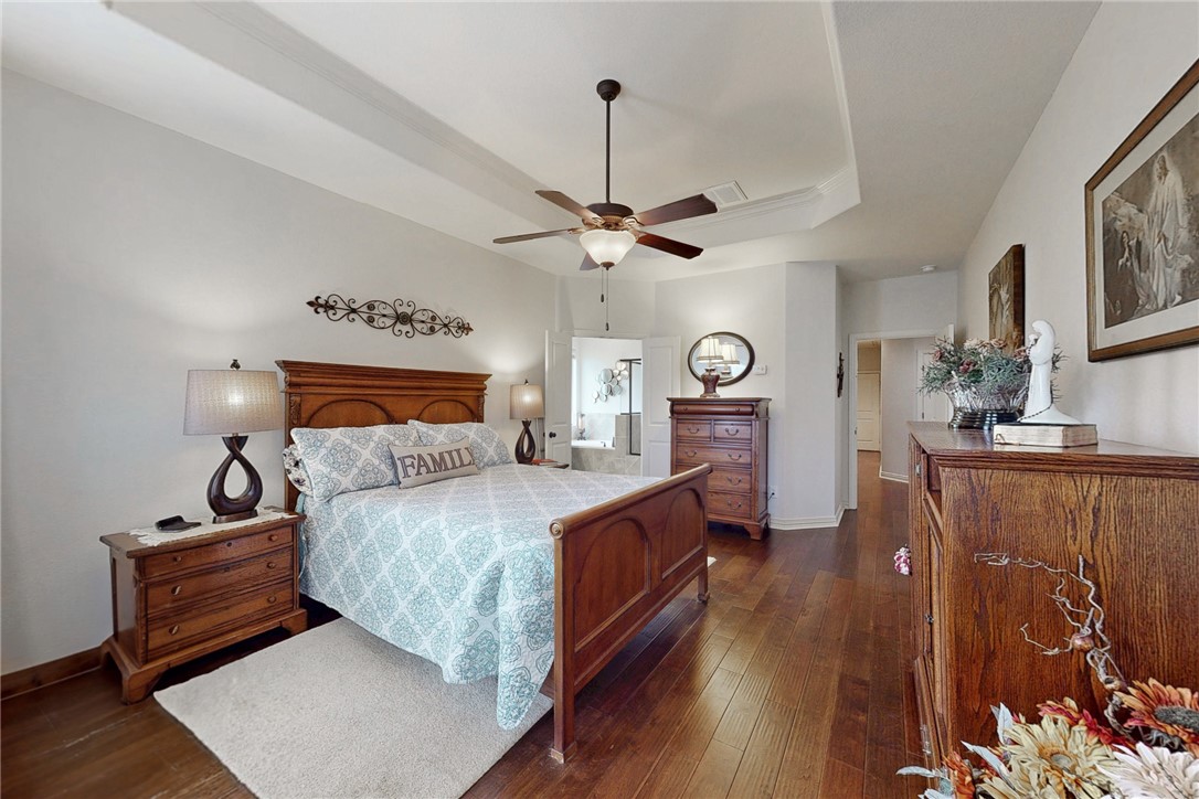 3317 Fiddlers Green Bryan, TX 77808 - Photo 19 of 39 Spacious Primary Bedroom with Tall Windows and Tray Ceiling
