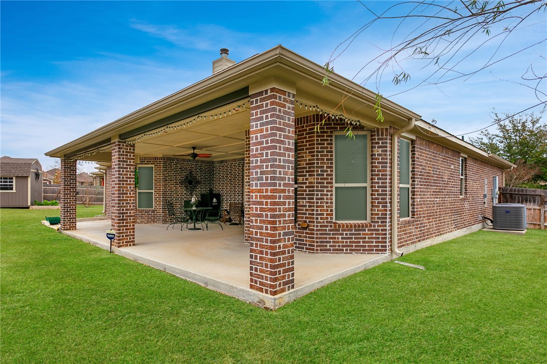 3317 Fiddlers Green Bryan, TX 77808 - Photo 31 of 36 a front view of a house with a yard