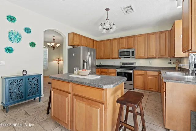 a bathroom with a tub and a window
