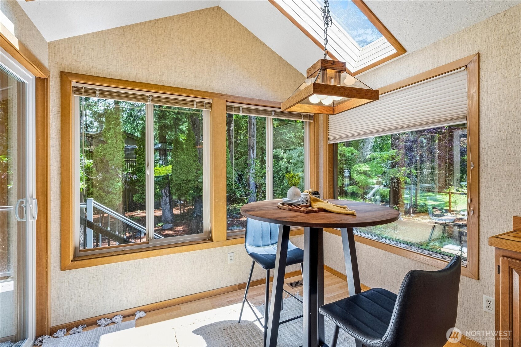 601 Clark Road Bellingham, WA 98225 - Photo 12 of 38 a view of a patio with a backyard table and chairs