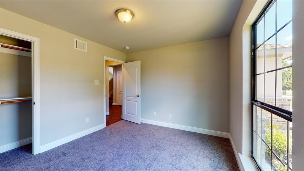 311 Mascot Street Houston, TX 77029 - Photo 8 of 23 a view of an empty room with a window