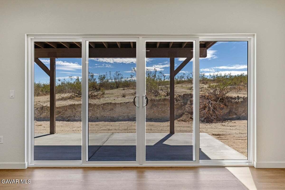 10654 Wilson Road California City, CA 93505 - Photo 12 of 36 a glass door with glass door