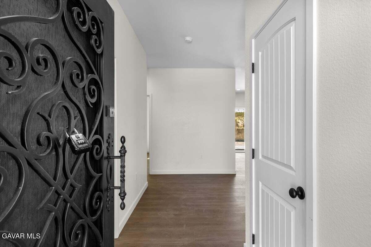 10654 Wilson Road California City, CA 93505 - Photo 4 of 36 a view of a door with a white door