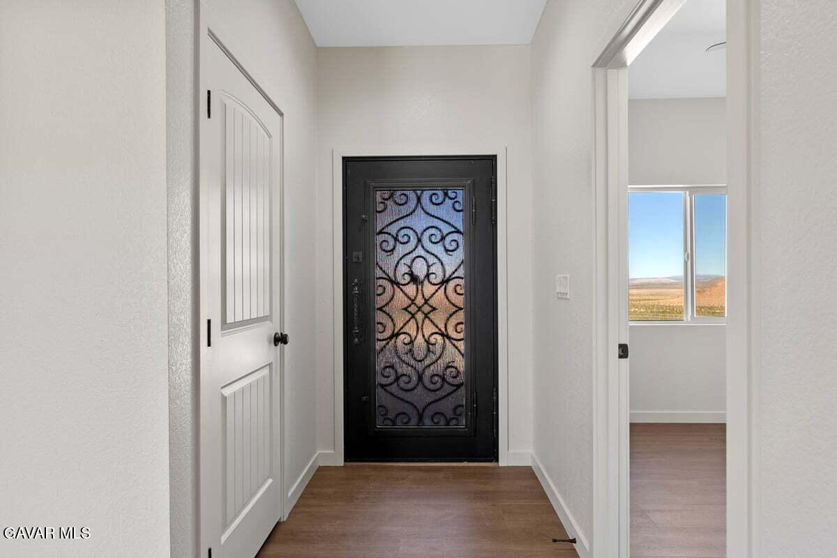 10654 Wilson Road California City, CA 93505 - Photo 5 of 36 a view of an entryway with a door