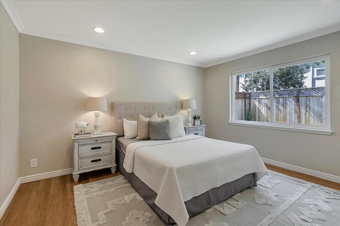 1963 Geneva Street San Jose, CA 95124 - Photo 14 of 35 a bedroom with a bed and a window