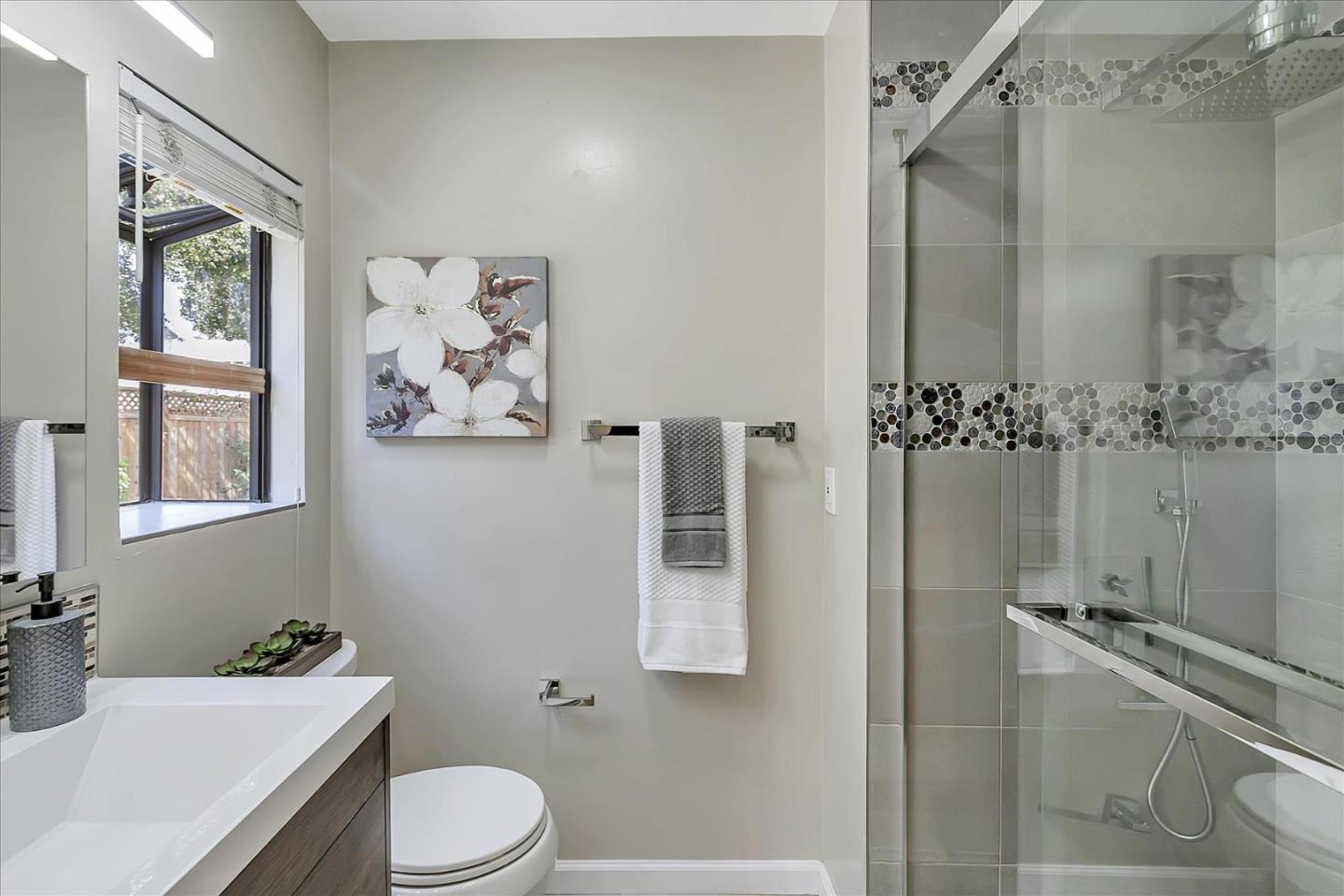 1963 Geneva Street San Jose, CA 95124 - Photo 17 of 35 a bathroom with a sink toilet and shower