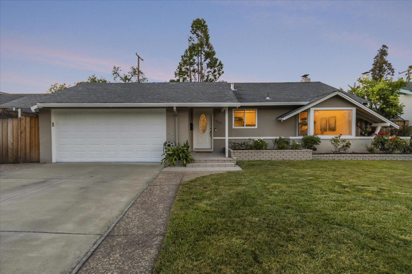 1963 Geneva Street San Jose, CA 95124 - Photo 2 of 35 a front view of a house with garden