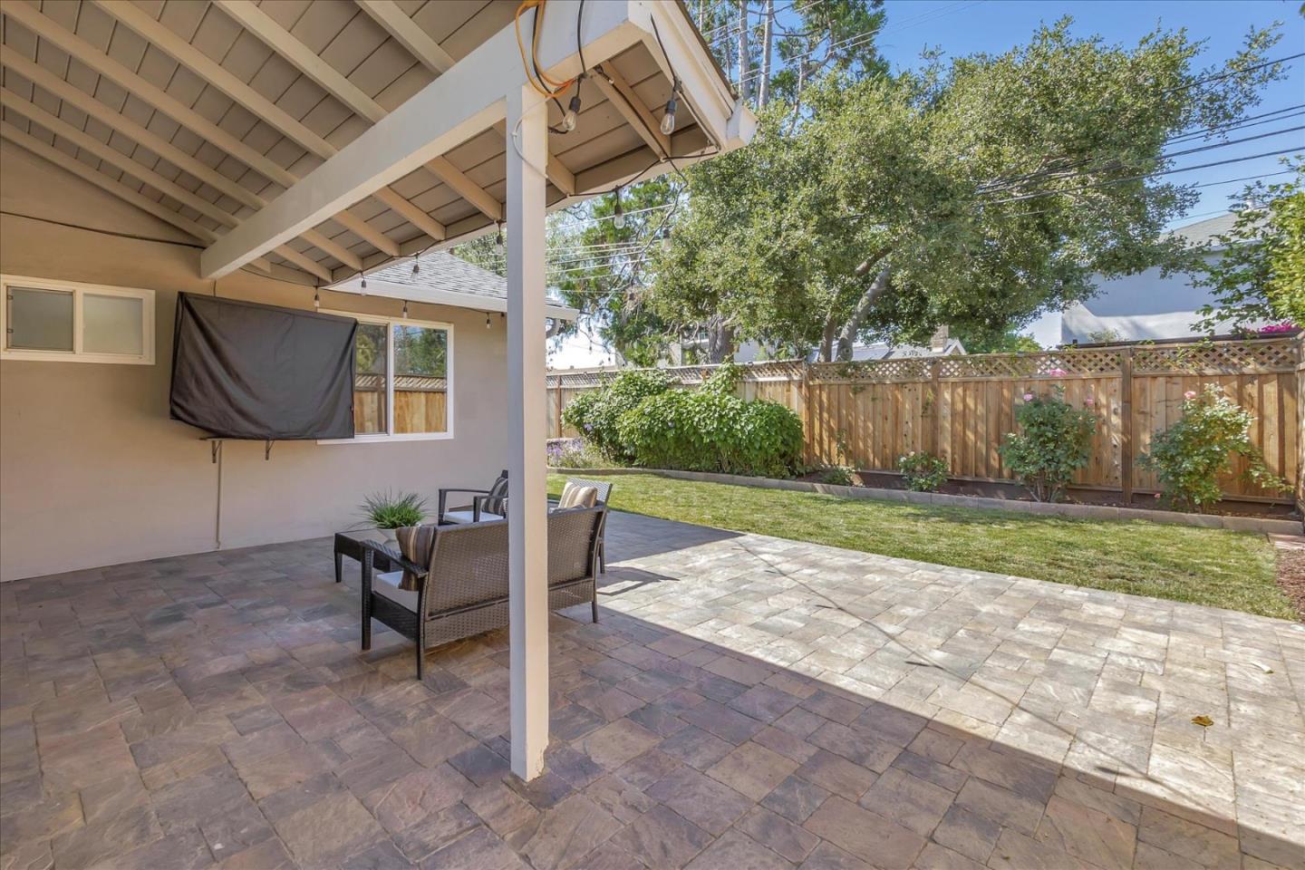 1963 Geneva Street San Jose, CA 95124 - Photo 24 of 35 a view of a backyard with couches plants and large tree