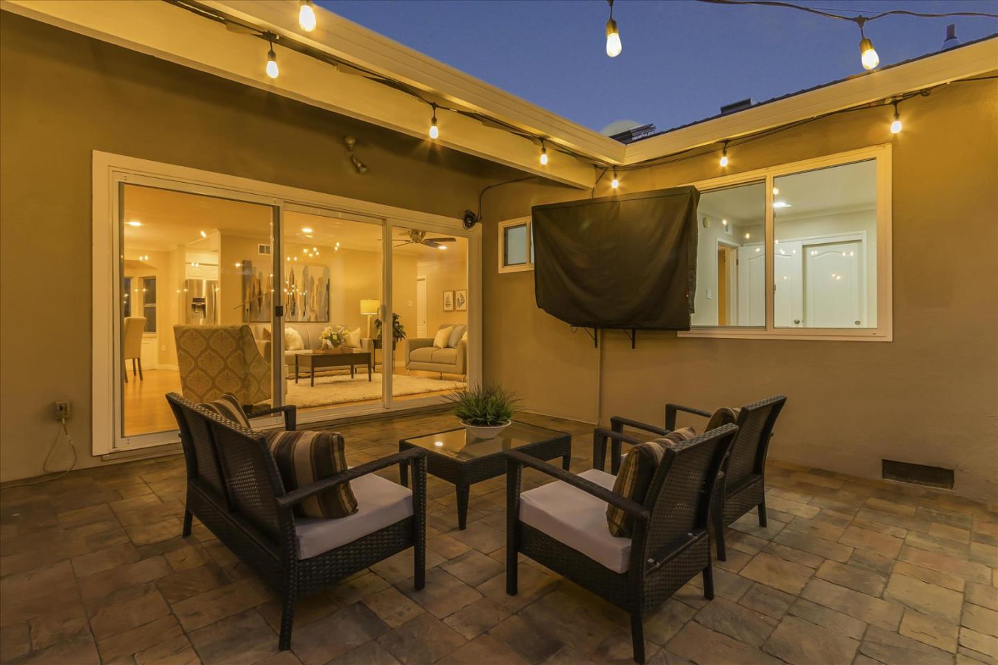 1963 Geneva Street San Jose, CA 95124 - Photo 34 of 35 a living room with furniture and a flat screen tv